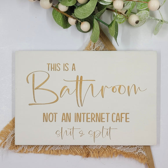 Hand painted Wooden Sign - This is a Bathroom